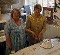 The Mayor and Mary Hart cut the cake